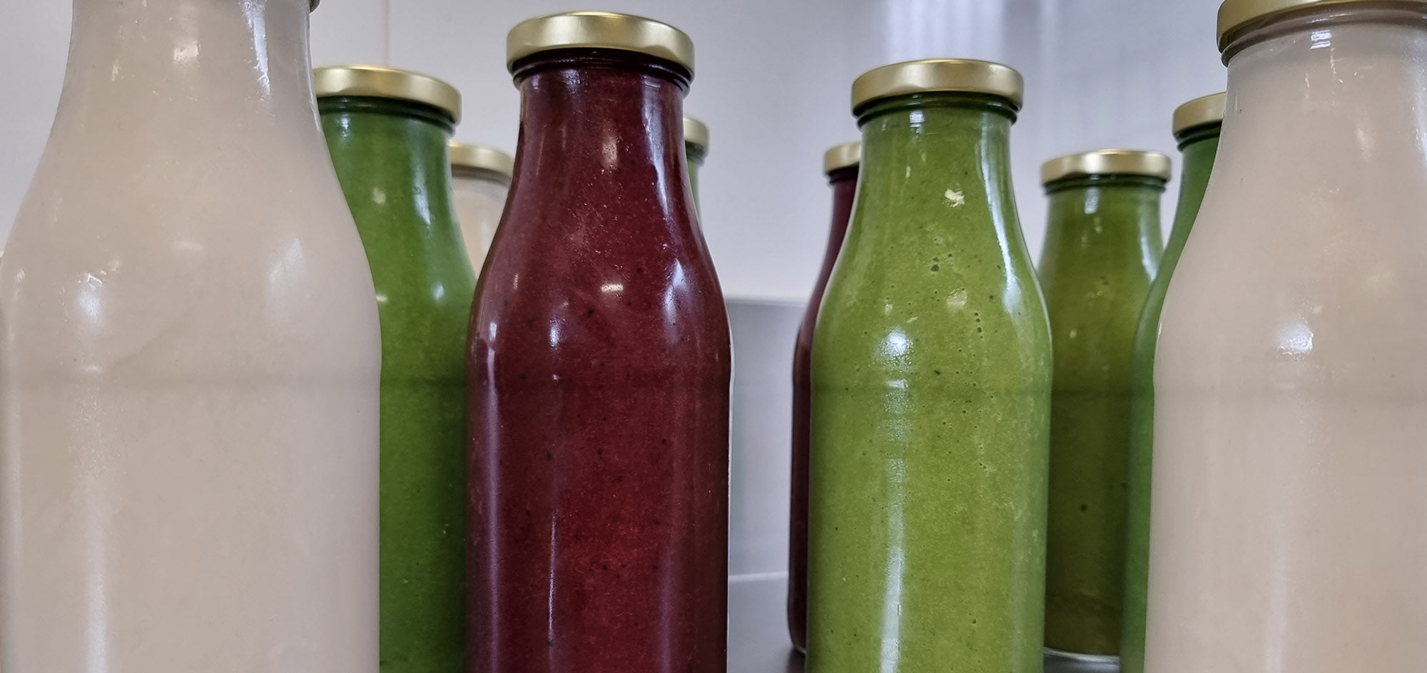 Juices smoothies and mylks for a juice cleanse or detox program from Detox Delivered